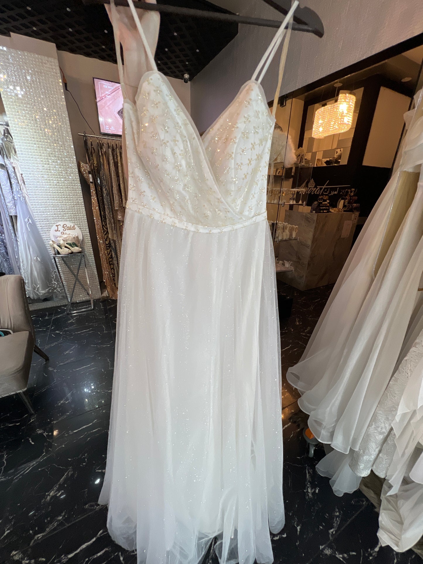 Sparkling Frost: White Glittered Dress with Delicate Straps and V-Neck