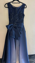 Regal Sparkle: Princess Style Dress with Embellishments and Back Bun