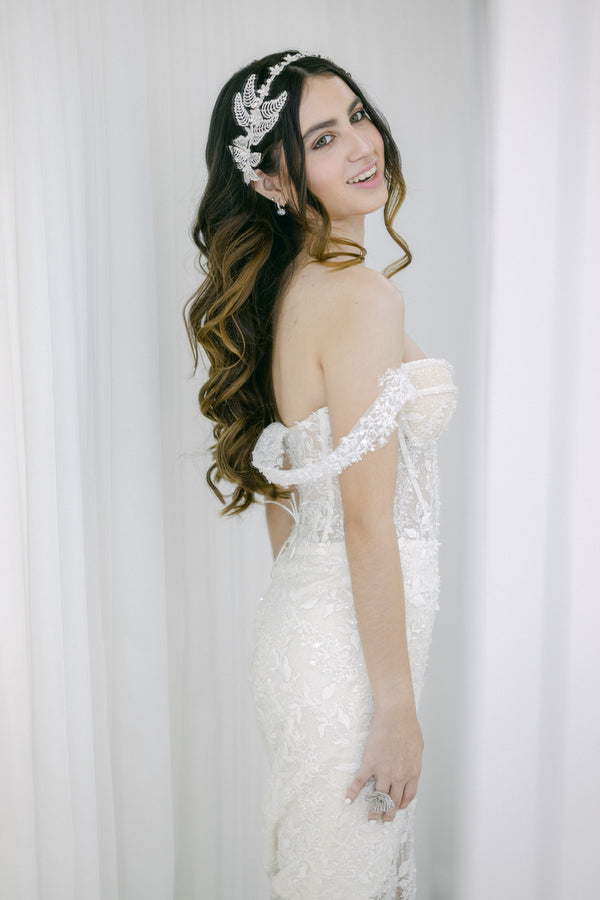 Vestido de novia estilo sirena con corset y floral