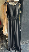 Zigzag Sparkle: Black Sequin Jumpsuit with High Neckline