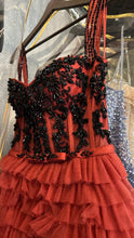 Crimson ruffled elegant gown
