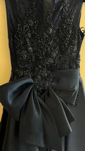 Regal Sparkle: Princess Style Dress with Embellishments and Back Bun