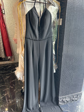 Sparkling Night: Black V-neck Jumpsuit with Shimmering Waistline