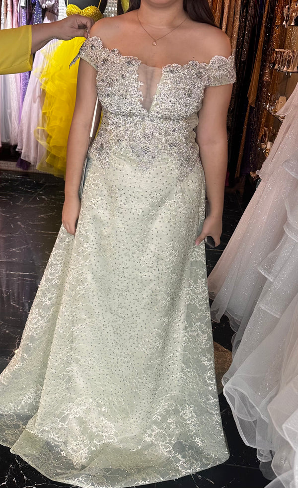 Minty Elegance: Silver-Studded Lace Dress with Bold Straps