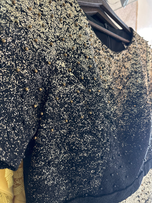 Ebony Elegance: Black Dress with Scattered Black Pearls & Golden Splashes