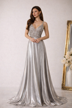 Silver Shimmer: Metallic Sequin Dress with Bold Chest and Strappy Back