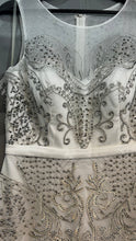 Silver Sea Siren: White Mermaid Dress with Silver Embellishments
