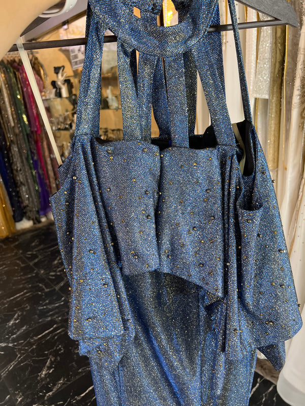 Stardust Blue Mermaid Gown: Shimmering Elegance with Bold Strappy Neckline and Off-Shoulder.