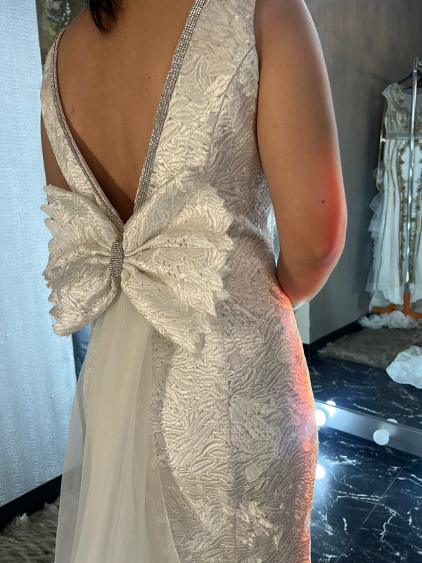 Mariam Wedding Dress: White Elegance with Silver Crystal Belt and Detachable Back Bun