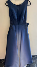 Regal Sparkle: Princess Style Dress with Embellishments and Back Bun