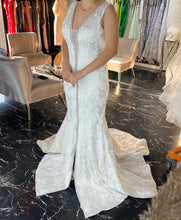 Mariam Wedding Dress: White Elegance with Silver Crystal Belt and Detachable Back Bun