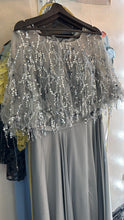 Silver Feathered Glamour: A-Line Satin Dress with Feathered Sleeves