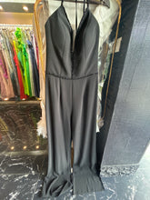 Sparkling Night: Black V-neck Jumpsuit with Shimmering Waistline