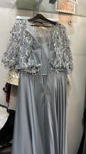 Silver Feathered Glamour: A-Line Satin Dress with Feathered Sleeves