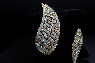 Set de pulsera y aretes cristales plateados estilo hojas