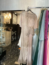 Pink beige dress with pleated design on waist