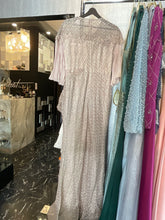 Pink beige dress with pleated design on waist