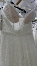 Vestido de novia linea A de corse transparente y falda de shimmer floral