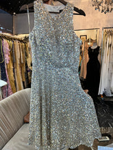 Flowy White: Dress with Golden Sequins and Backline Detail