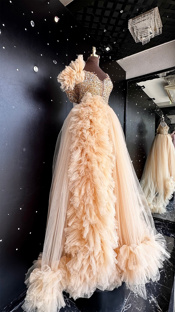 Champagne Dream: A Regal Beige Dress with Gold Stones